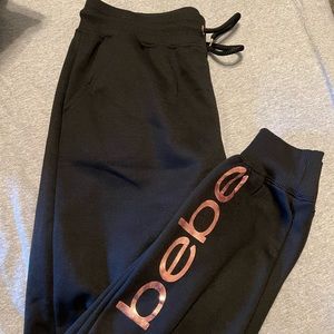 Womens large Bebe sweat pants brand new with tags!!